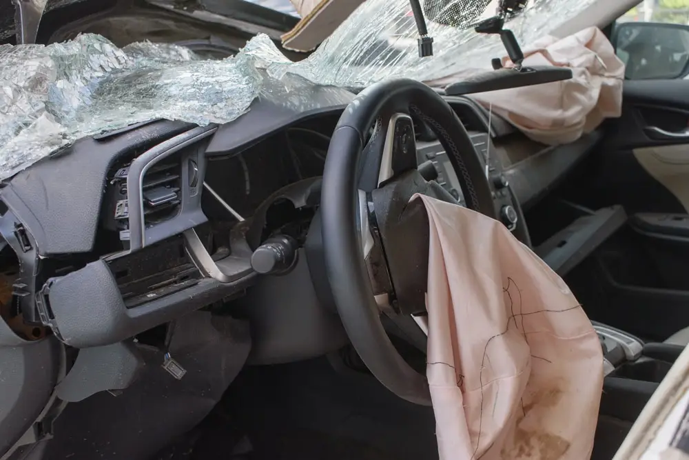 Exploding airbag in a car crash