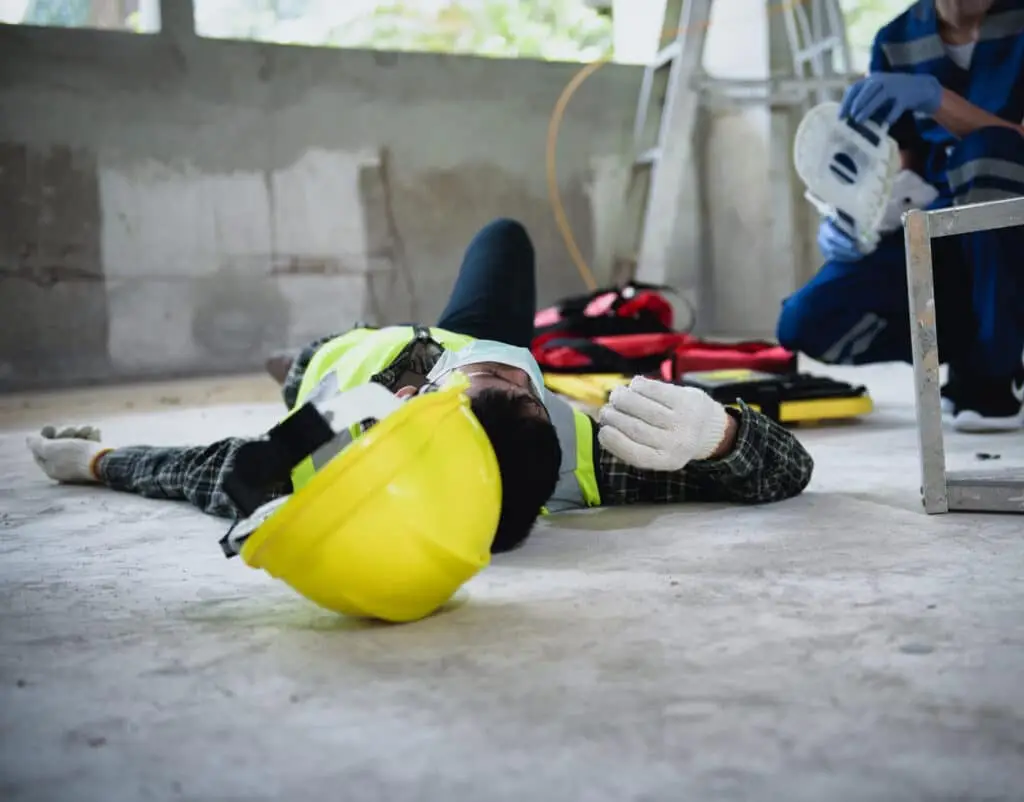 Builder accident falls ladder on floor and unconscious