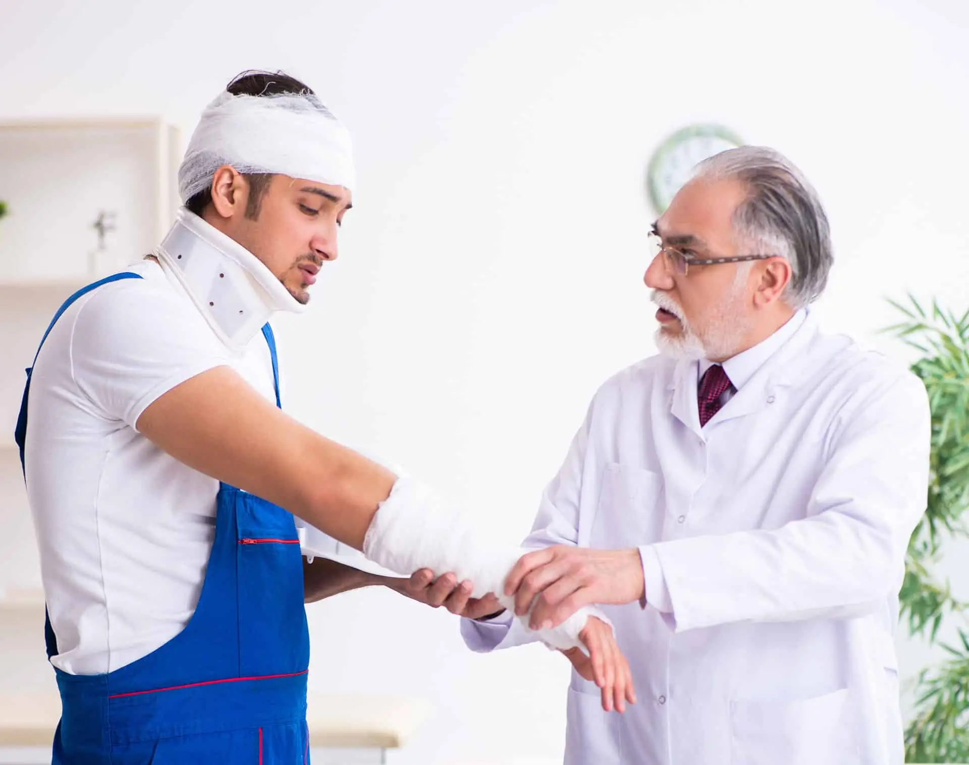 Young male contractor visiting old doctor