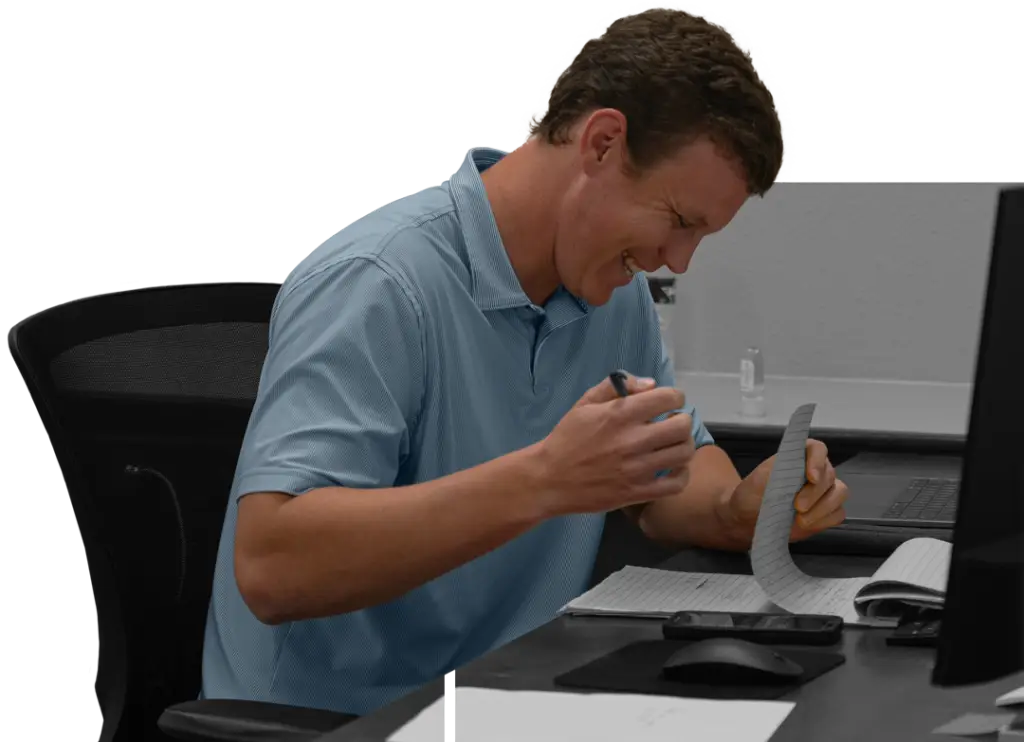 Austin working on his desk