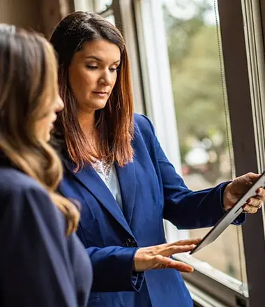 Women looking at a tablet