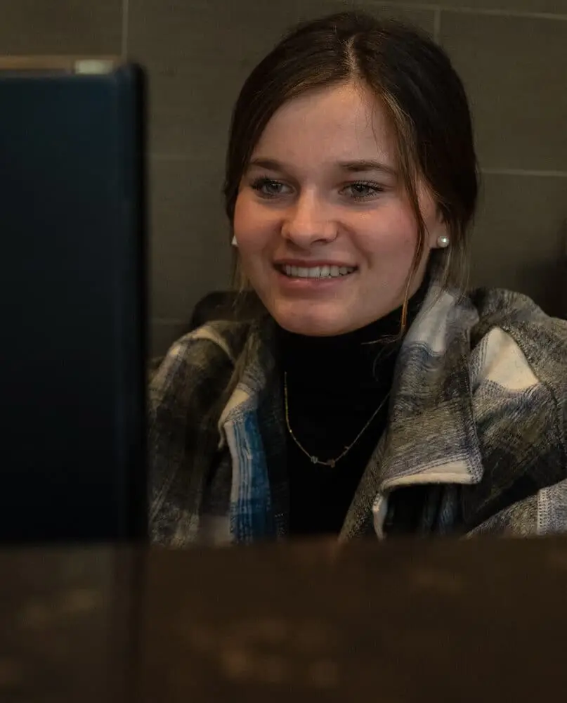 Woman looking at computer