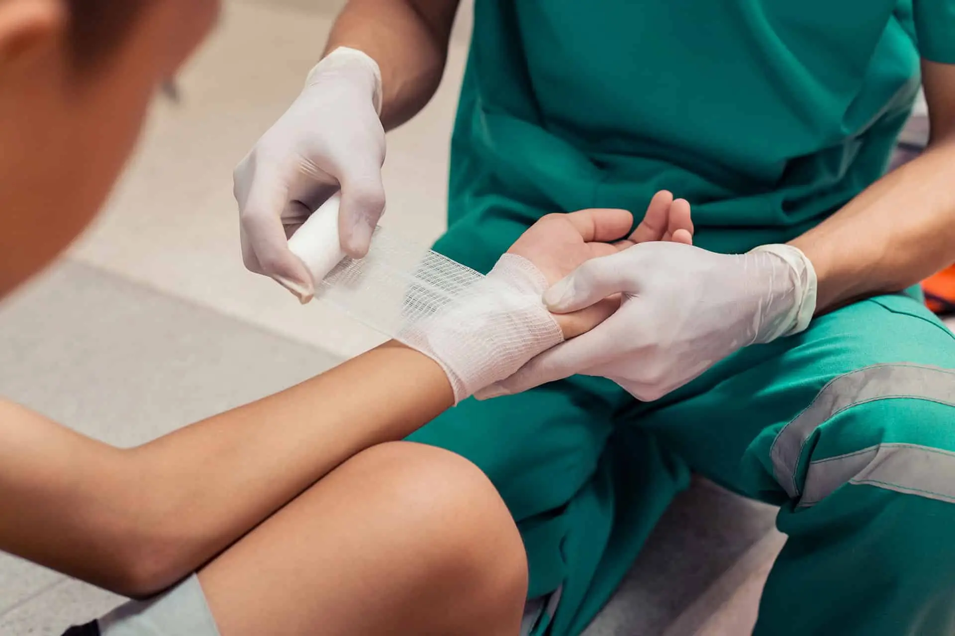 Doctors are treating a patient by bandages.