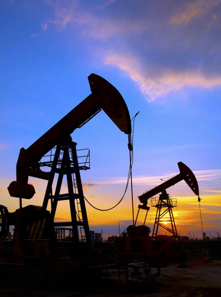 Oil pump on orange sunset