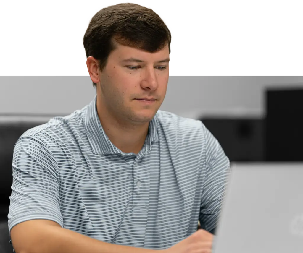 Lane working on his desk