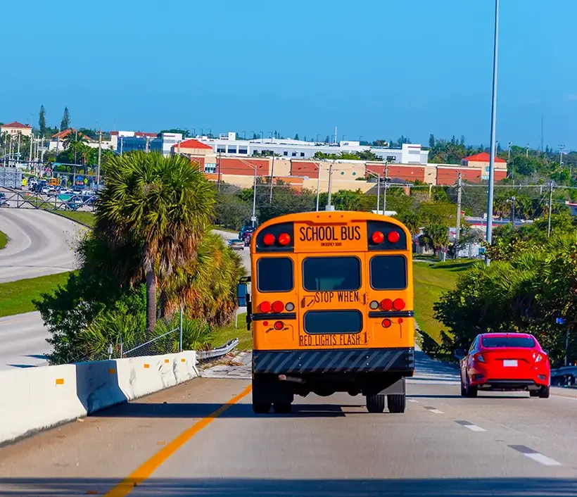 the rear view of a of school bus on the highway in louisiana