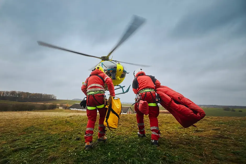 Paramedics running to an helicopter