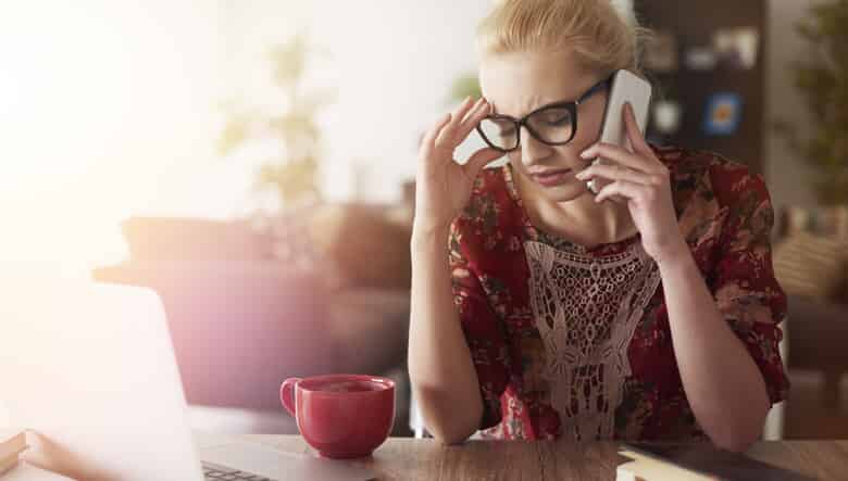 Frustrated woman on phone