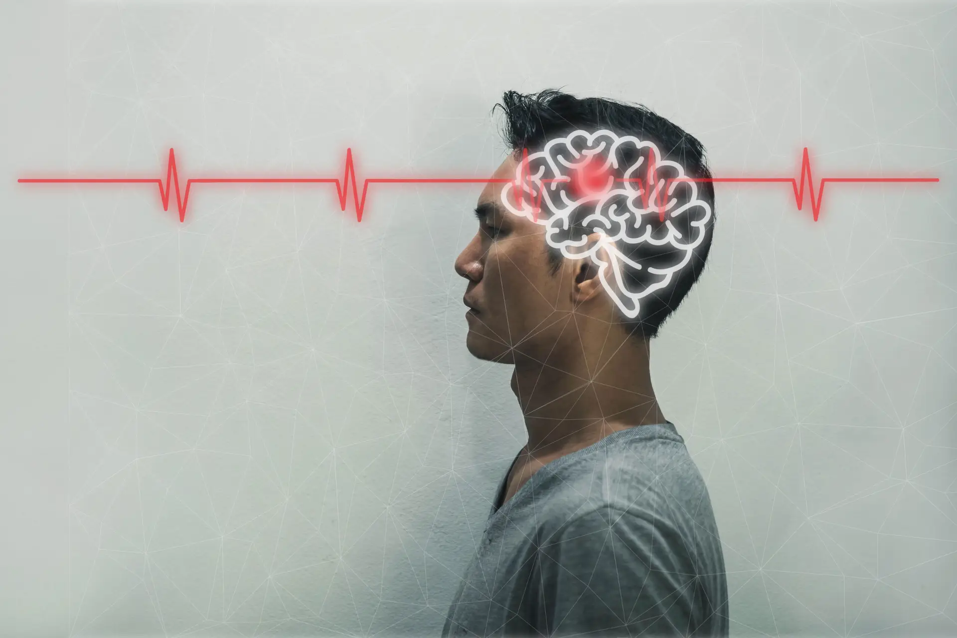 man with a highlighted brain and a red line running through it symbolizing nerve damage or issues