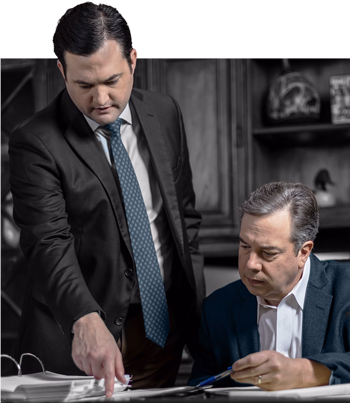 Attorneys Trey Morris and Justin Dewett working together on a case